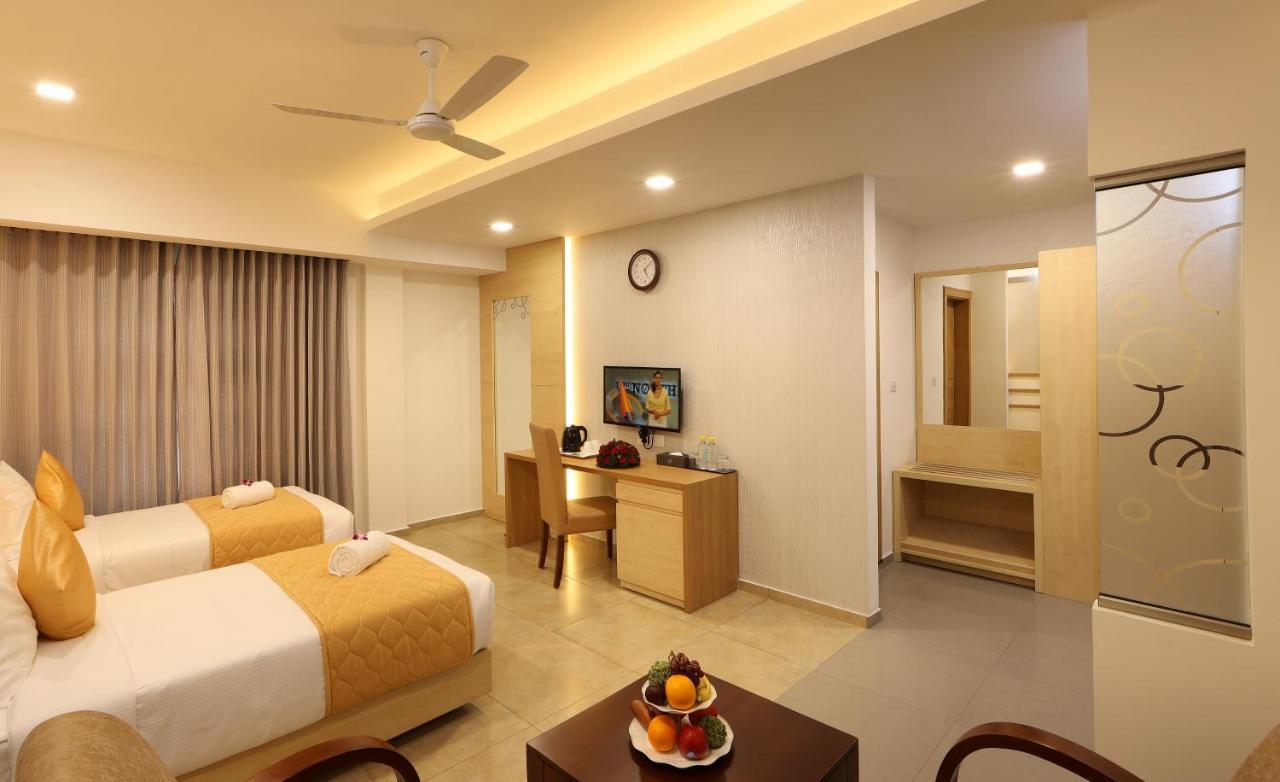 Hotel Flora Charishma Residency Aluva
