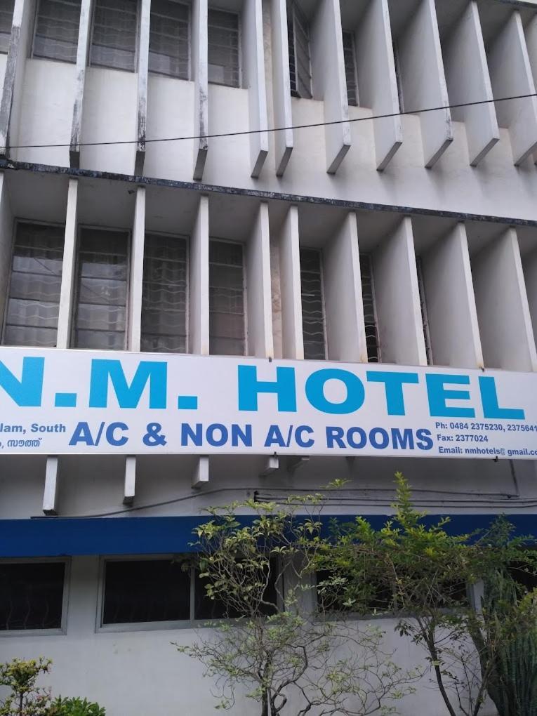 N M