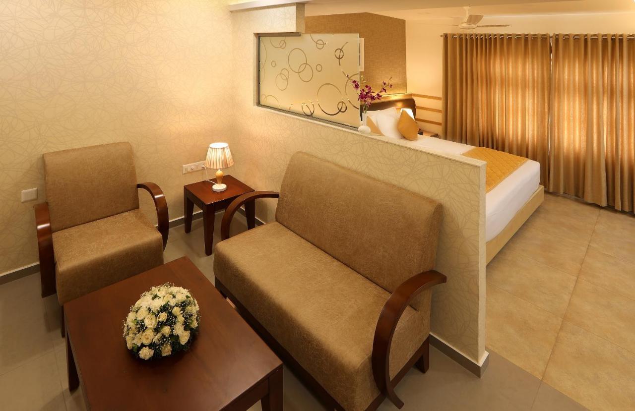 Hotel Flora Charishma Residency Aluva Kochi