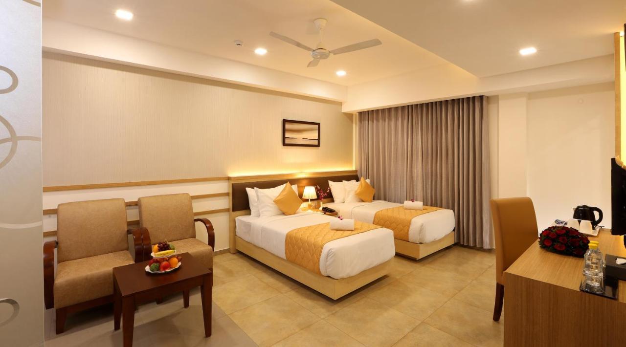 Hotel Flora Charishma Residency Aluva