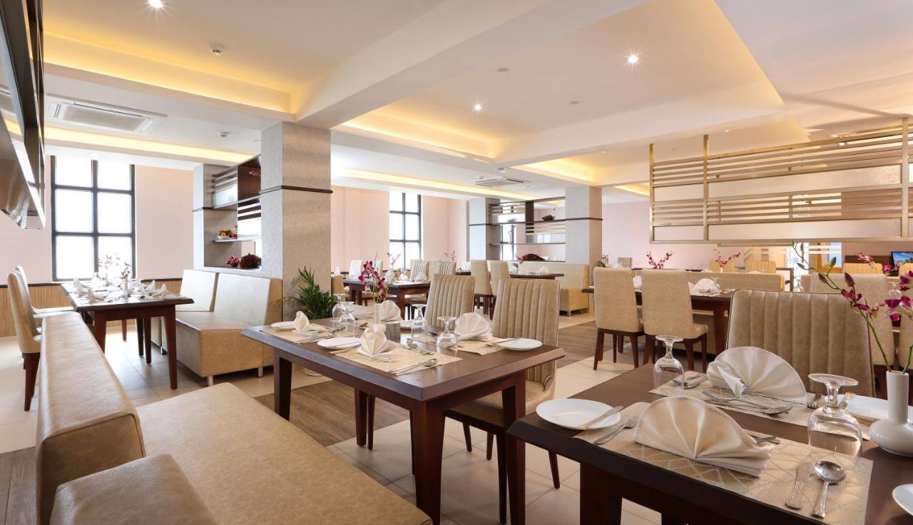 Hotel Flora Charishma Residency Aluva