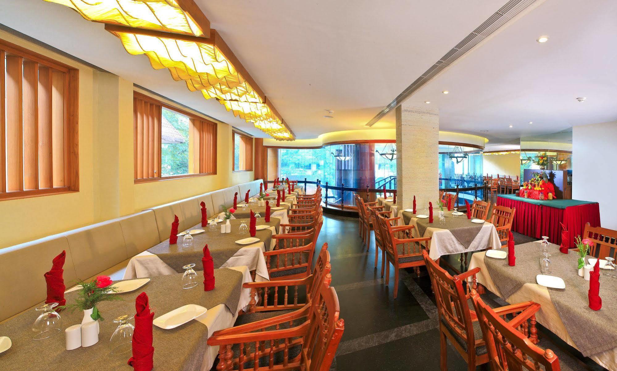 The Woods Manor Mg Road Hotel Kochi
