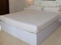 Super Townhouse Malabar Illam Hotel