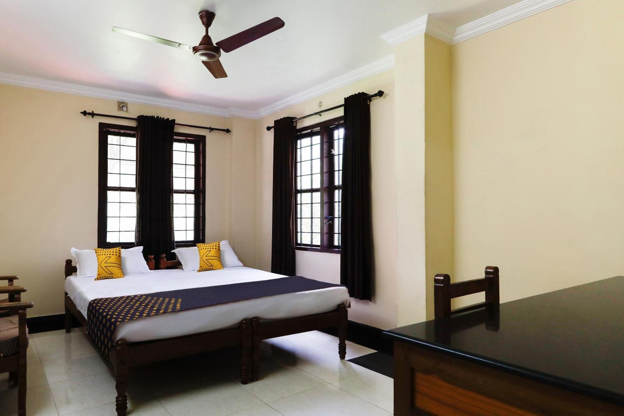 Spot On Sahari Kochi