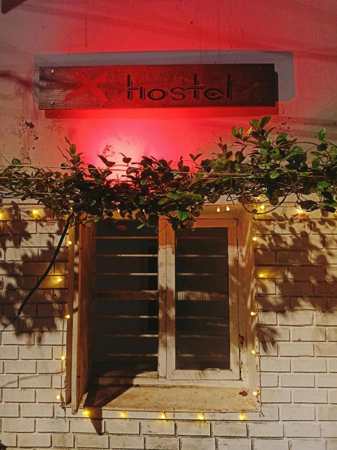 X Hostel *